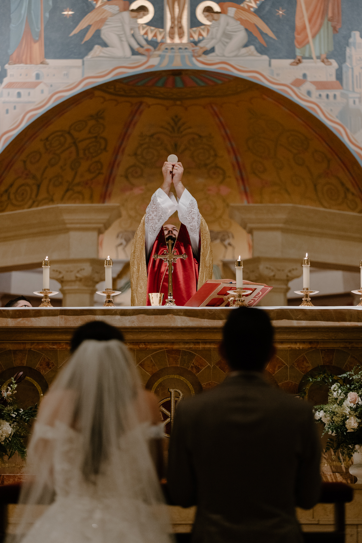 Priest holding eucharist