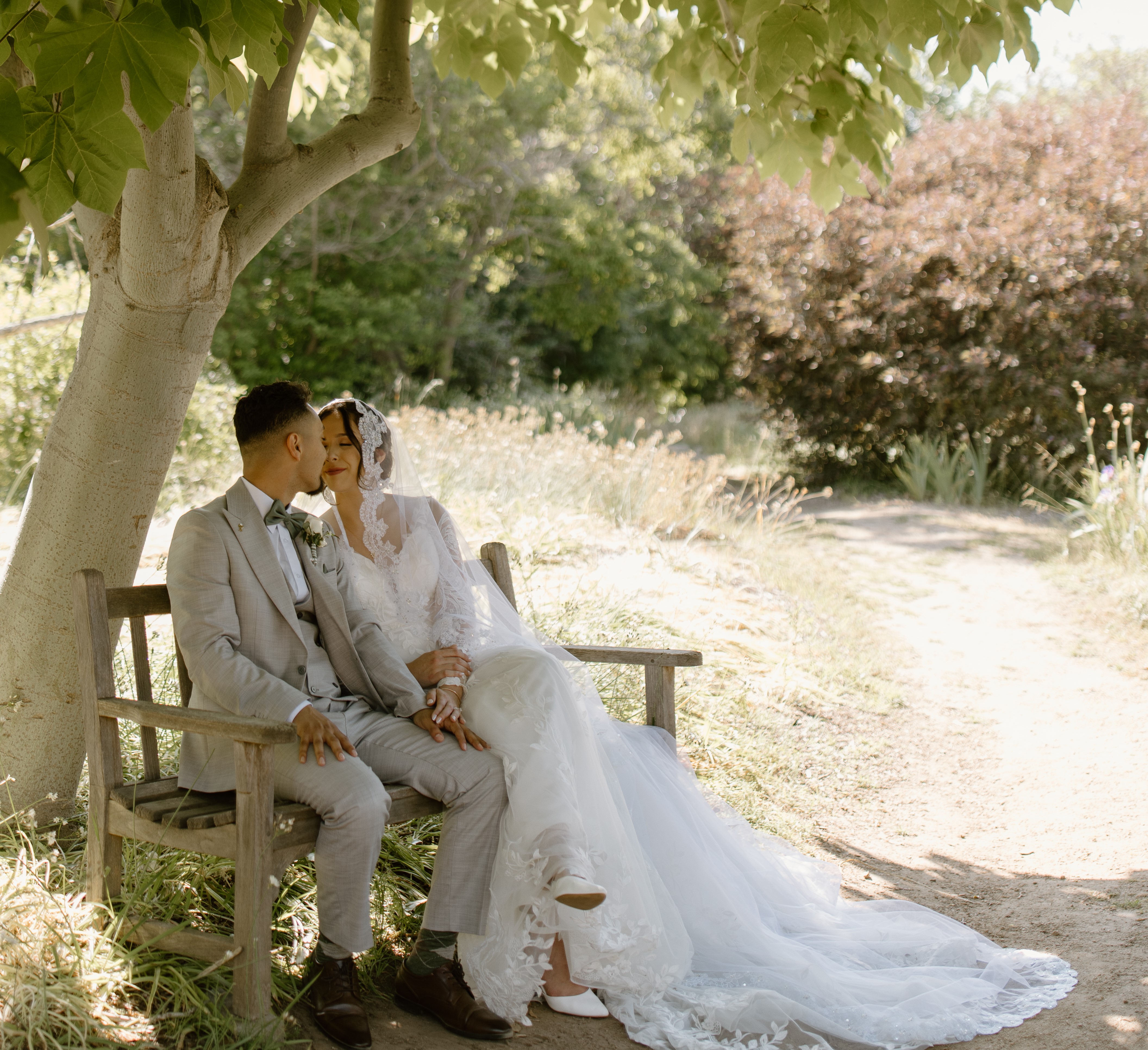 Couple sitting under tree